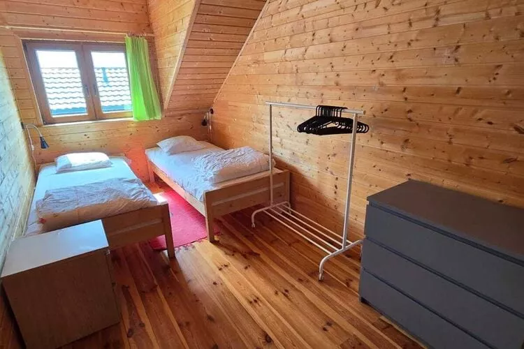 Domki wakacyjne STANDARD dla 6 osób Sarbinowo-Slaapkamer