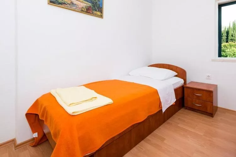 Apartments Azzurro- One Bedroom Apartment with Terrace and Hot Tub ( Azzurro II-gornji)-Slaapkamer