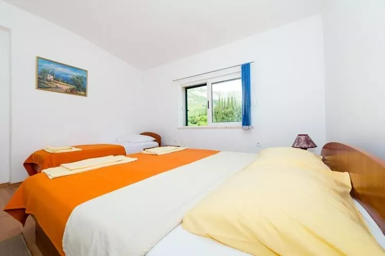 Apartments Azzurro- One Bedroom Apartment with Terrace and Hot Tub ( Azzurro II-gornji)-Slaapkamer