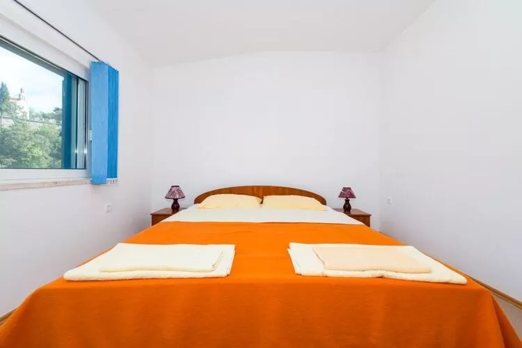 Apartments Azzurro- One Bedroom Apartment with Terrace and Hot Tub ( Azzurro II-gornji)-Slaapkamer