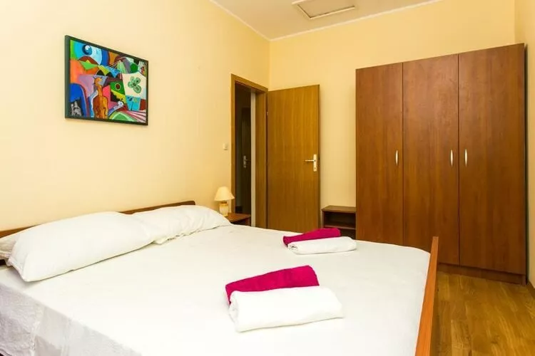 Apartment & Room Braica - One-Bedroom Apartment with Balcony-Slaapkamer