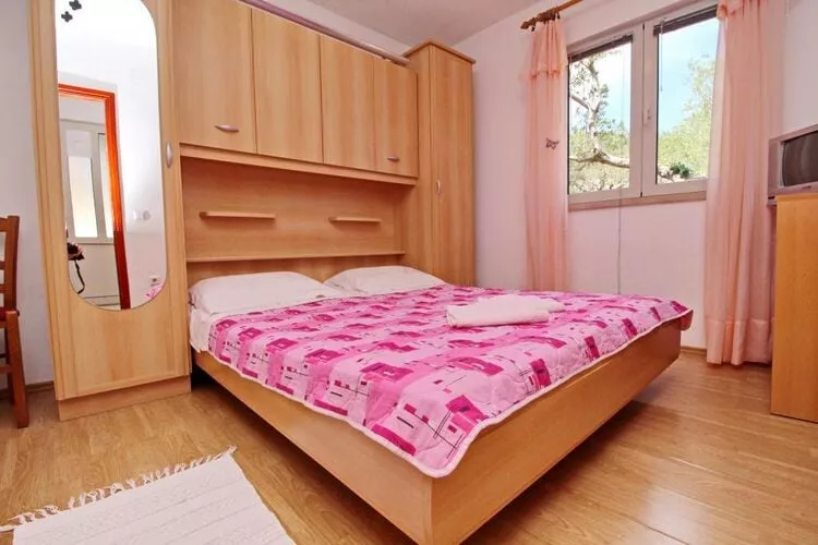 Apartments Radojković Lumbarda -One Bedroom Apartment with Terrace and Partial Sea View(A1)-Slaapkamer