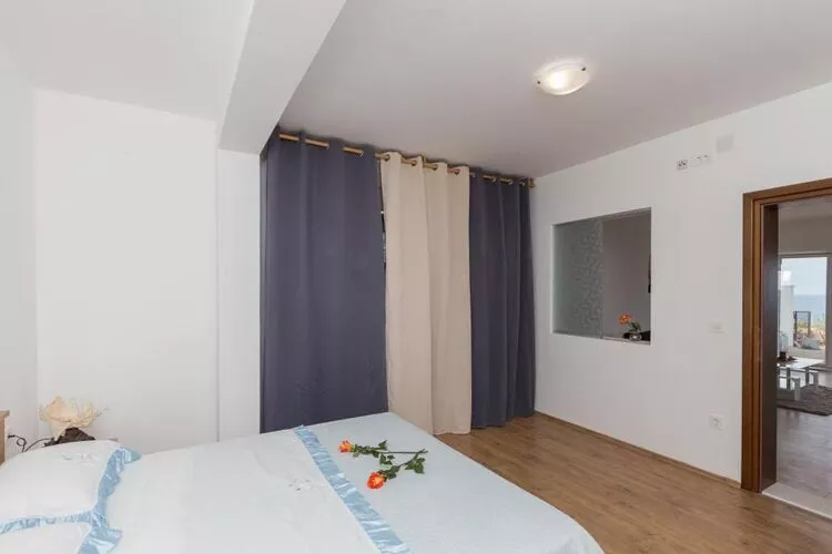 Apartments Manuela - Comfort One-Bedroom Apartment with Terrace and Sea View-Slaapkamer