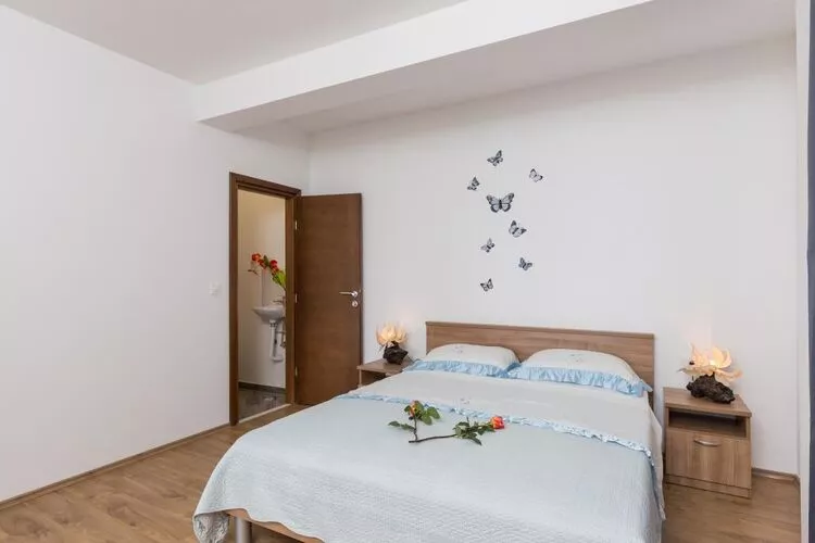 Apartments Manuela - Comfort One-Bedroom Apartment with Terrace and Sea View-Slaapkamer