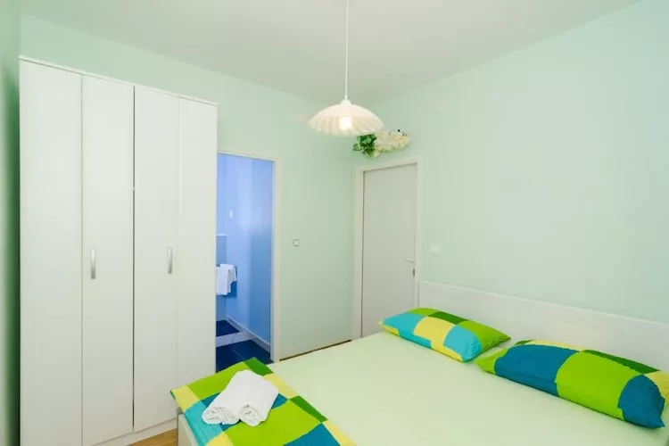 Apartments & Rooms Tapera- Standard One Bedroom Apartment with Terrace and Garden View ( ZELENI 2 )-Slaapkamer