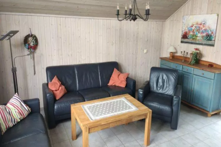 FH Wildgans Comfort mit Sauna & Kaminofen 81 qm 74-Woonkamer