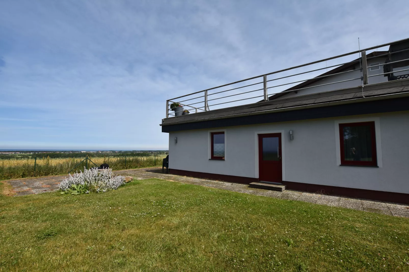 Ferienwohnung mit Meerblick-Buitenkant zomer