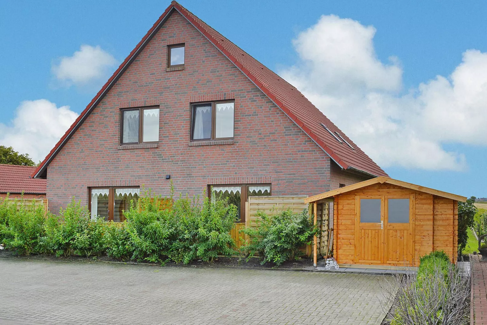 Fewo Wattkieker - Wattseite-Buitenkant zomer