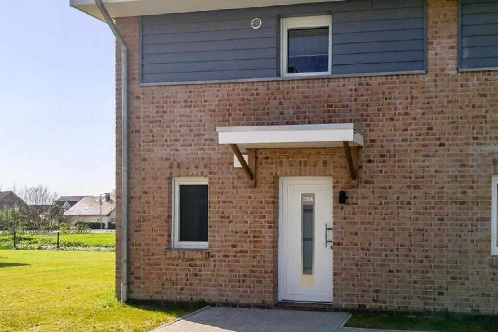 Ferienhaus Tossens Seestern Haus/Whg 3-Buitenkant zomer