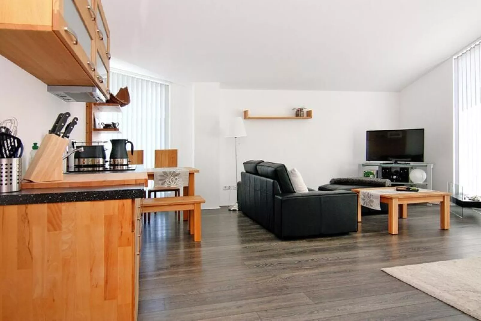 Apartments home Calmsailing, Börgerende-App. 1.1 mit Meerblick 1. OG-Woonkamer