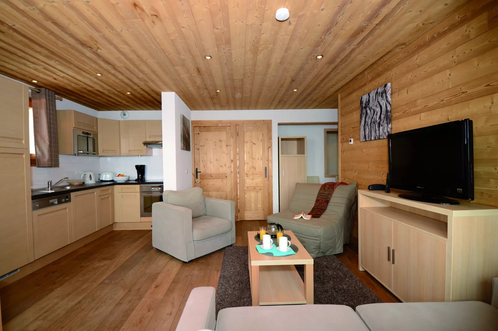 Authentiek appartement in het skigebied Le Grand Massif-Woonkamer