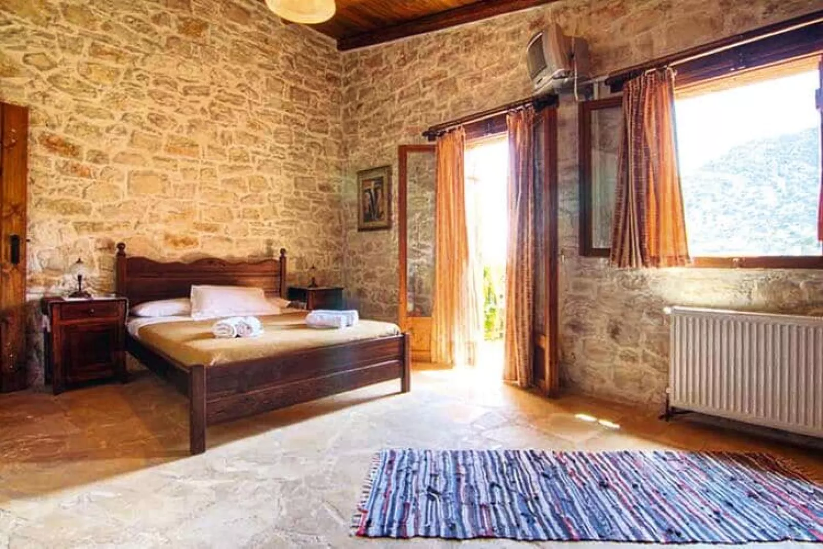 Holiday homes Stone Village Bali - Studio with halfboard-Slaapkamer
