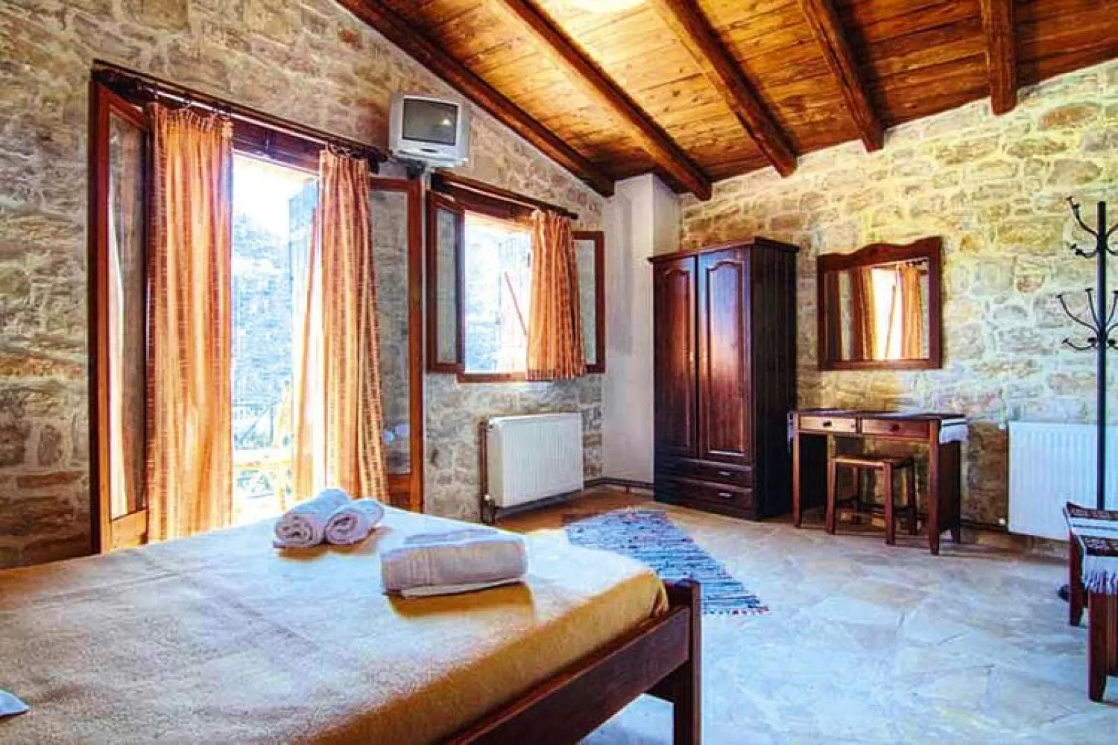 Holiday homes Stone Village Bali - Studio with halfboard-Slaapkamer