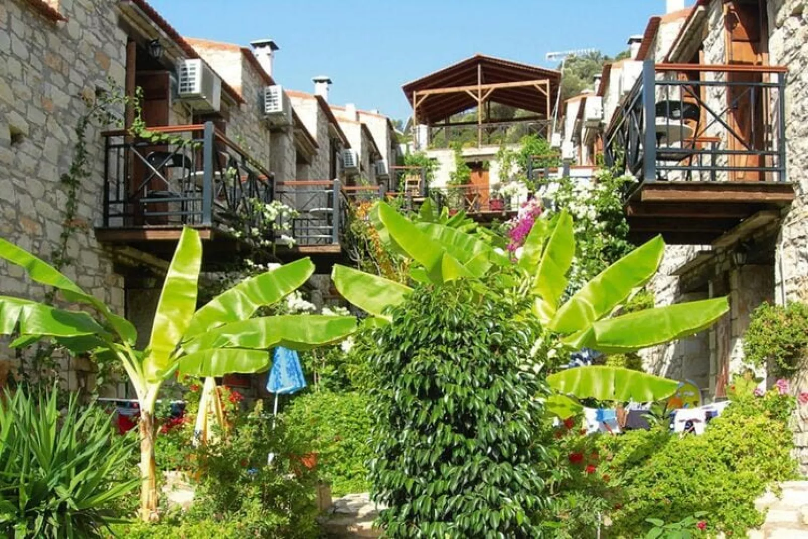 Holiday homes Stone Village Bali - Studio with halfboard-Tuinen zomer