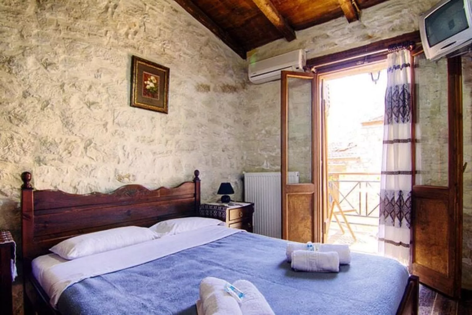 Holiday homes Stone Village Bali - Studio with halfboard-Slaapkamer