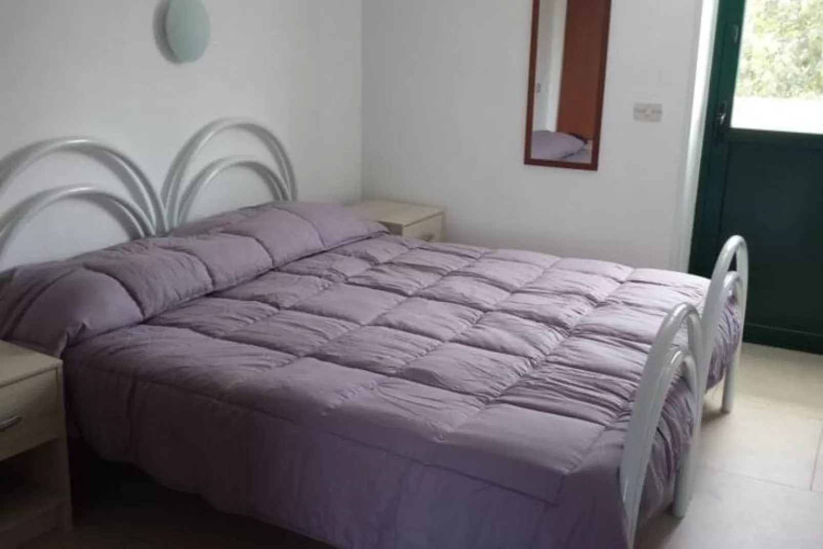 Appartement in Giardini Naxos met parkeerplaats-Slaapkamer