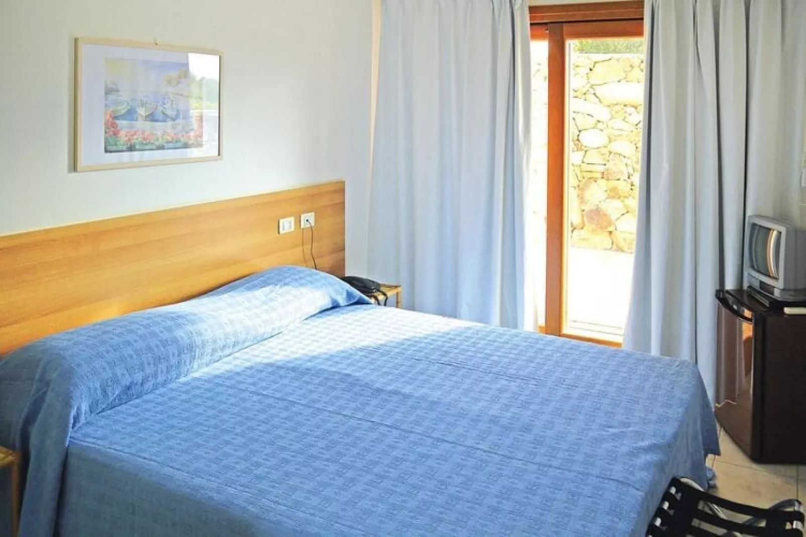 Holiday residence Il Nido dei Gabbiani Porto Pollo / Bilo comfort 4 pax con 2 bagni-Slaapkamer