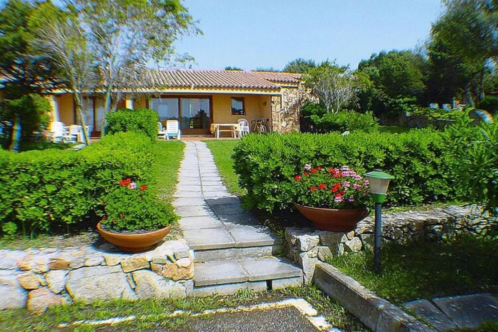 Holiday residence Il Nido dei Gabbiani Porto Pollo / Bilo comfort 4 pax con 2 bagni-Tuinen zomer