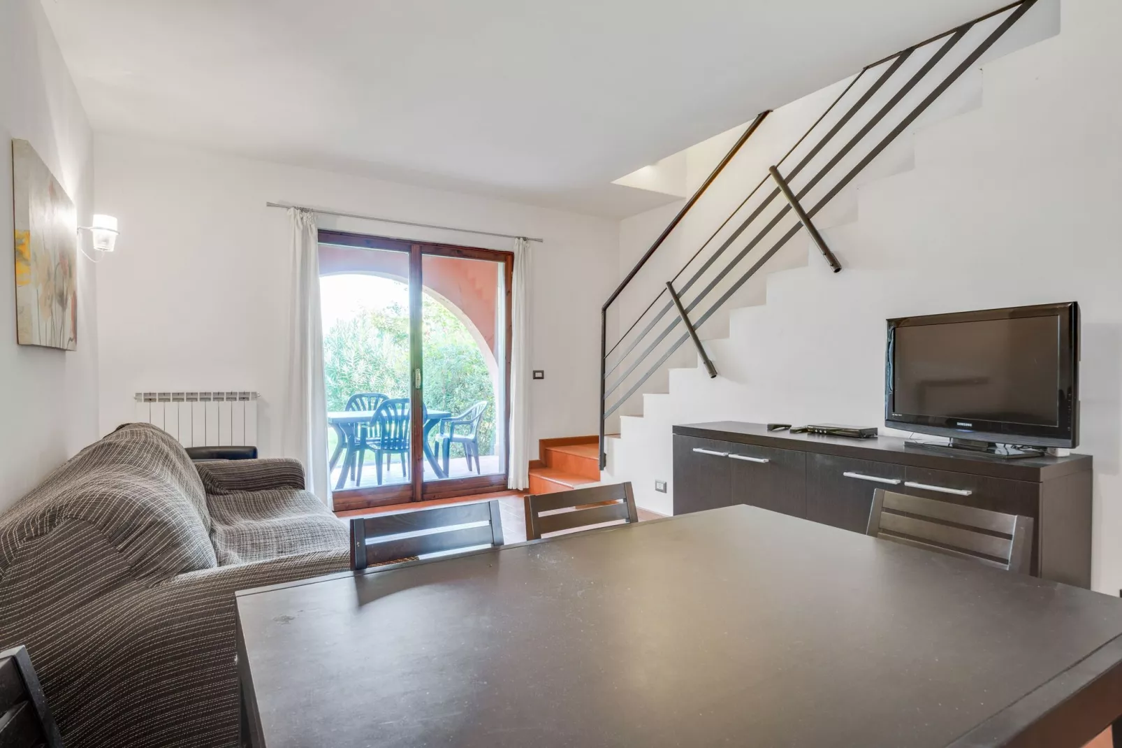 Gezellig vakantiehuis vlak bij het Gardameer met zwembad-Woonkamer