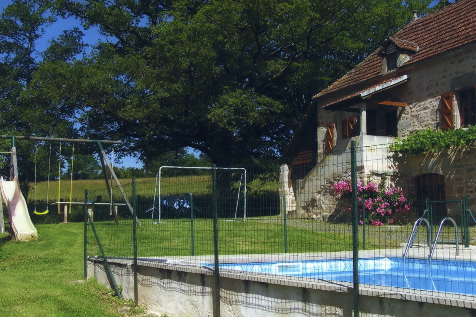 Maison de vacances Rueyres-Tuinen zomer