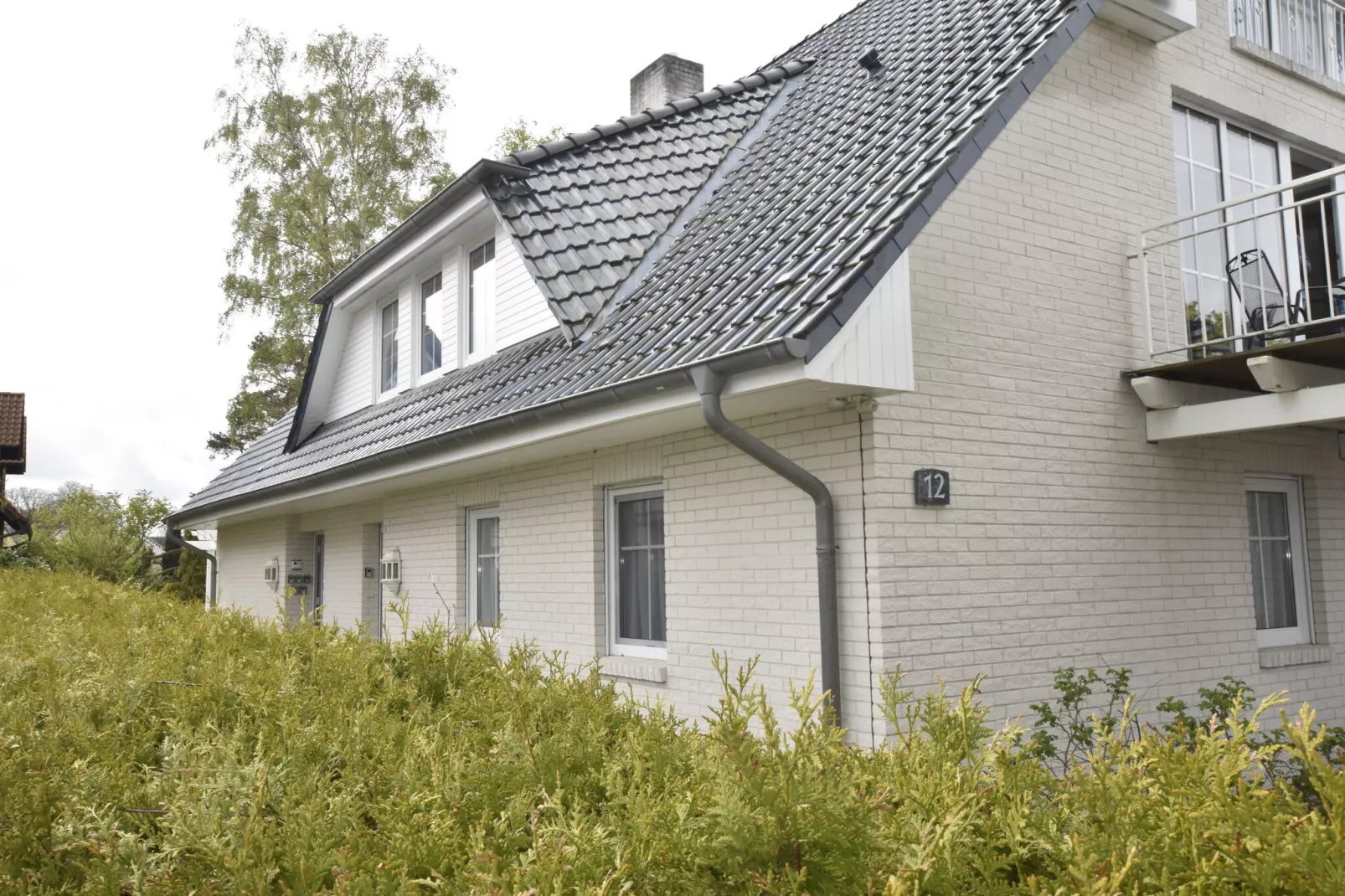 Arko 5 strandnah mit Balkon-Buitenkant zomer