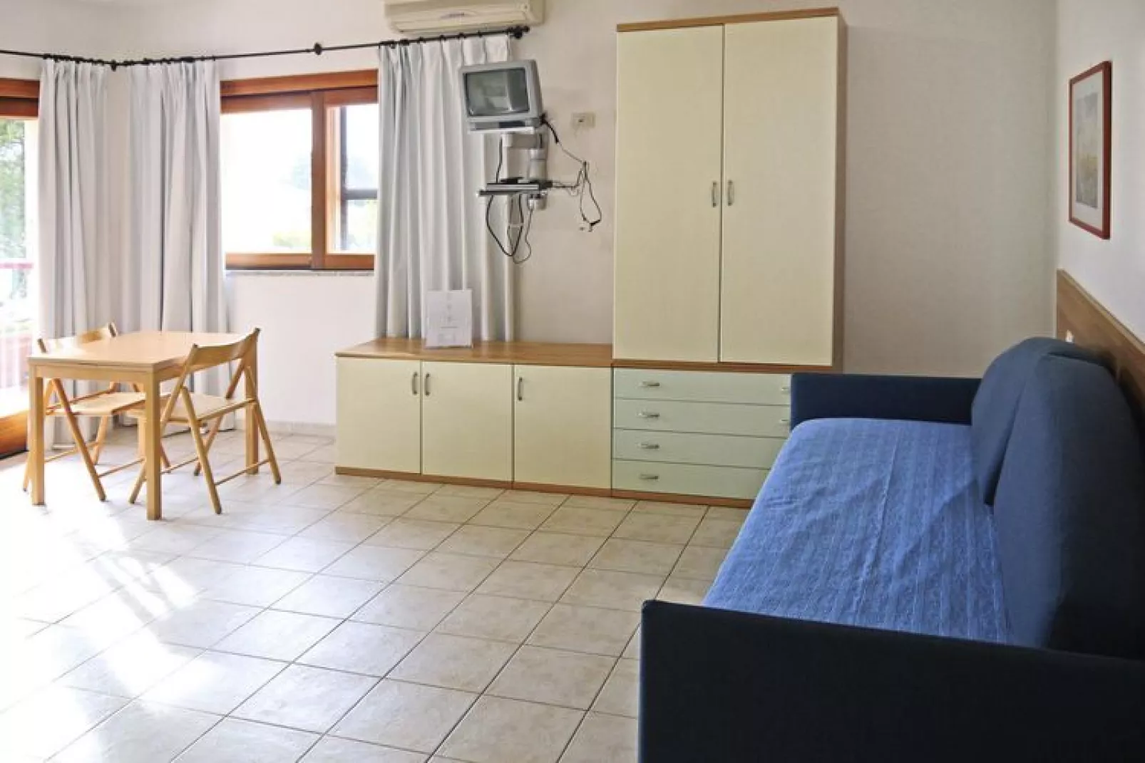 Holiday residence Il Nido dei Gabbiani Porto Pollo / Mono Comfort 2 pax-Woonkamer