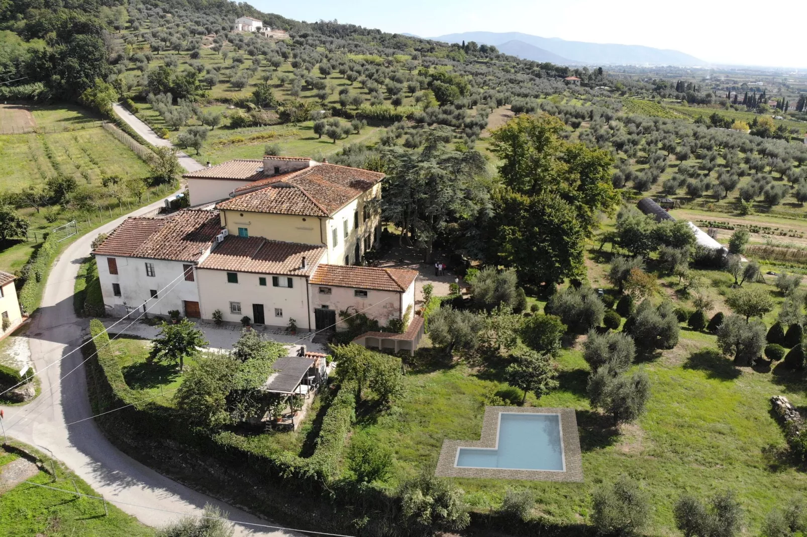 Villa dei Tarocchi-Buitenkant zomer