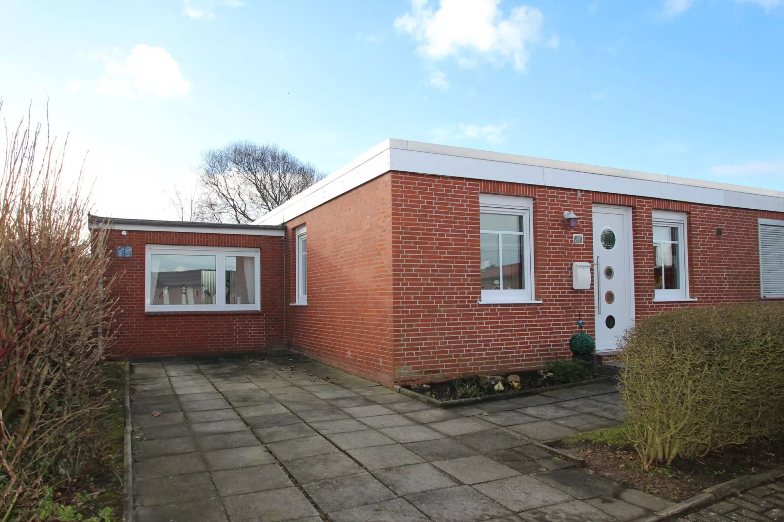 Ferienbungalow Wiesengrund mit Sauna-Buitenkant zomer