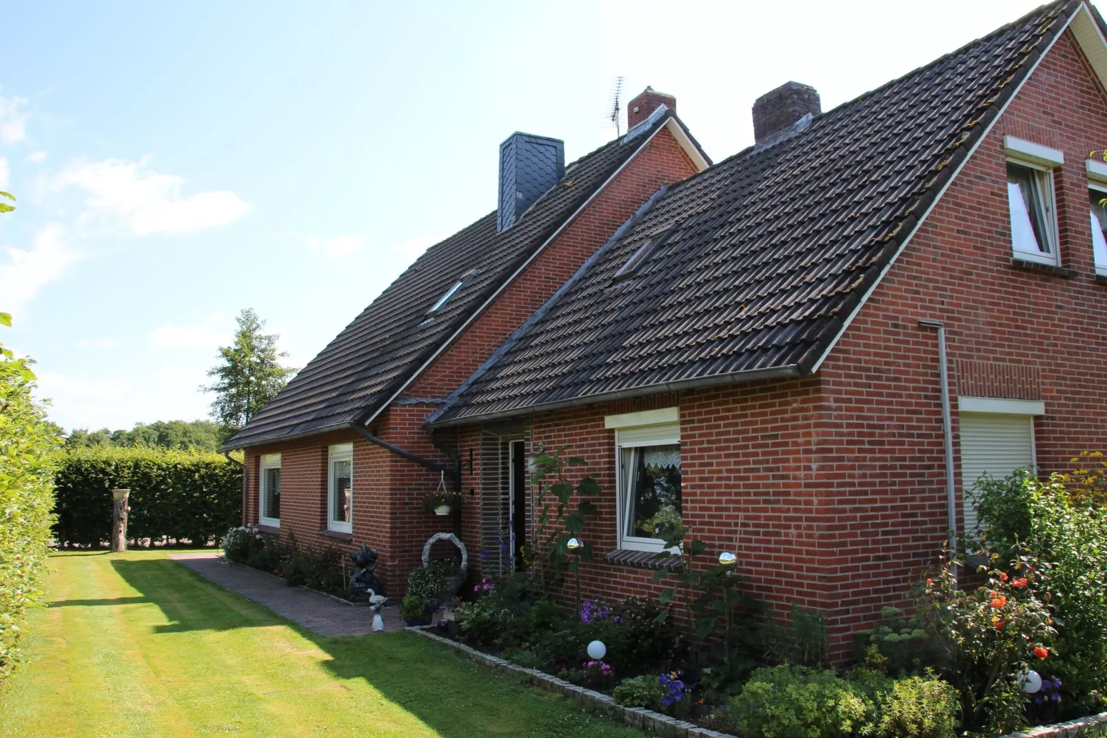 Ferienwohnung Moorhusen-Buitenkant zomer