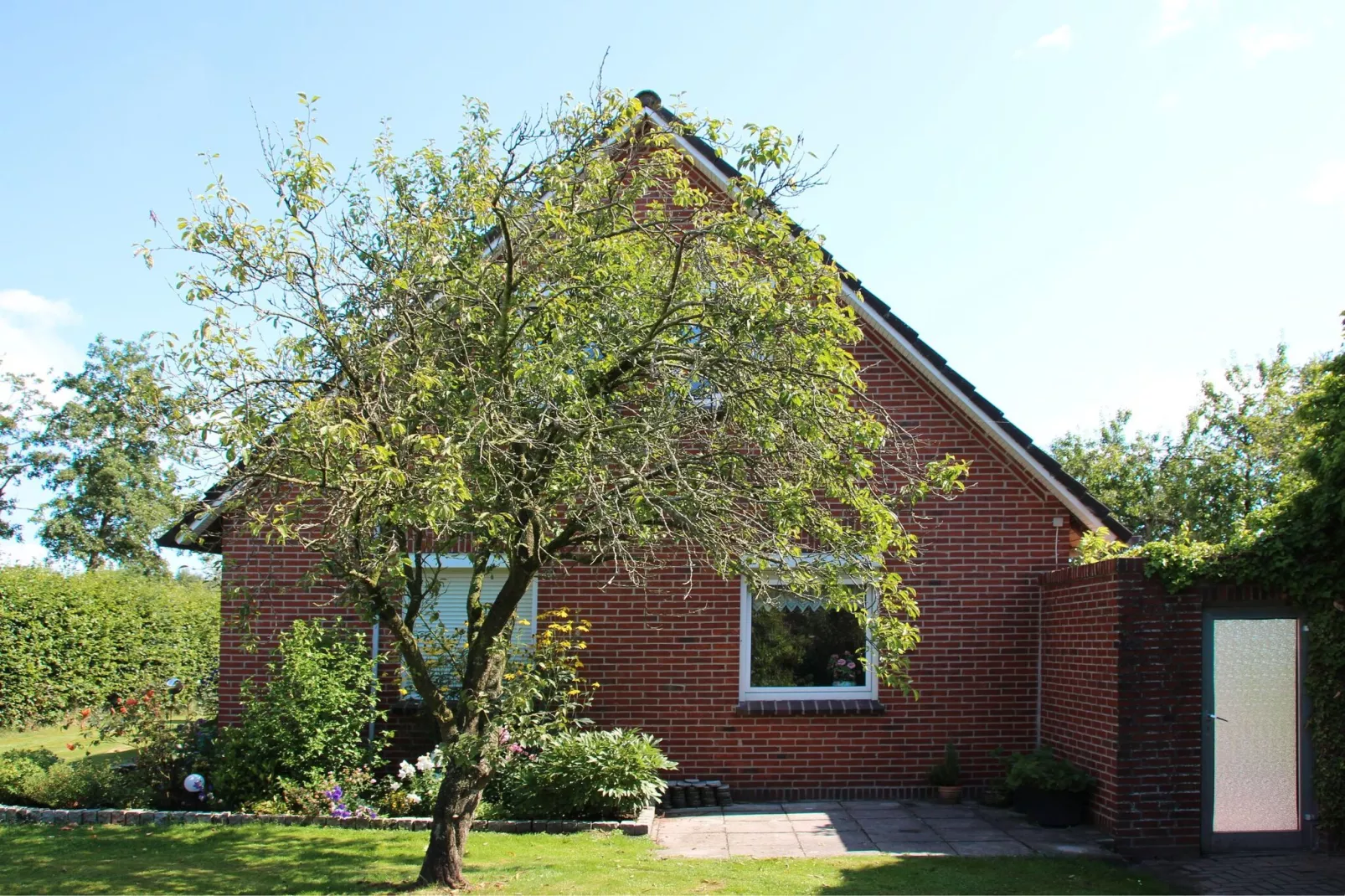 Ferienwohnung Moorhusen-Tuinen zomer