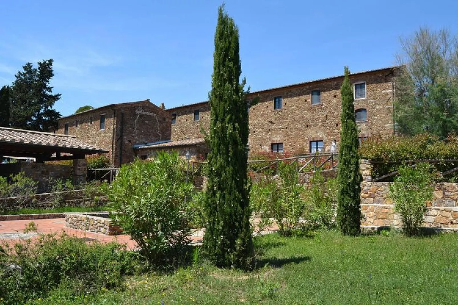 Holiday resort Antico Borgo Casalappi Campiglia Marittima - Type Trilo B- primo piano- balcone-Tuinen zomer