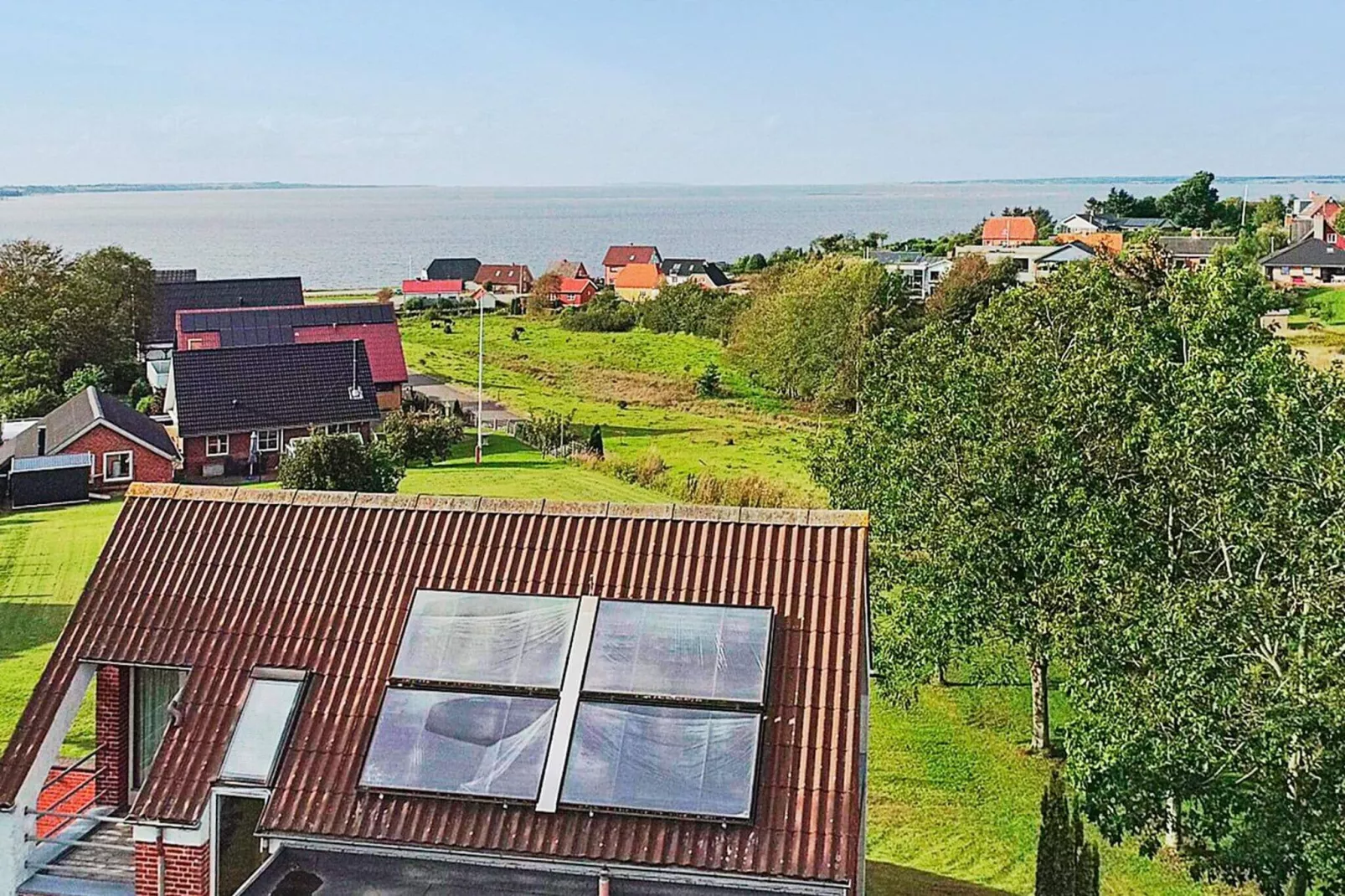 Modern vakantiehuis in Farsø met prachtig zwembad-Waterzicht