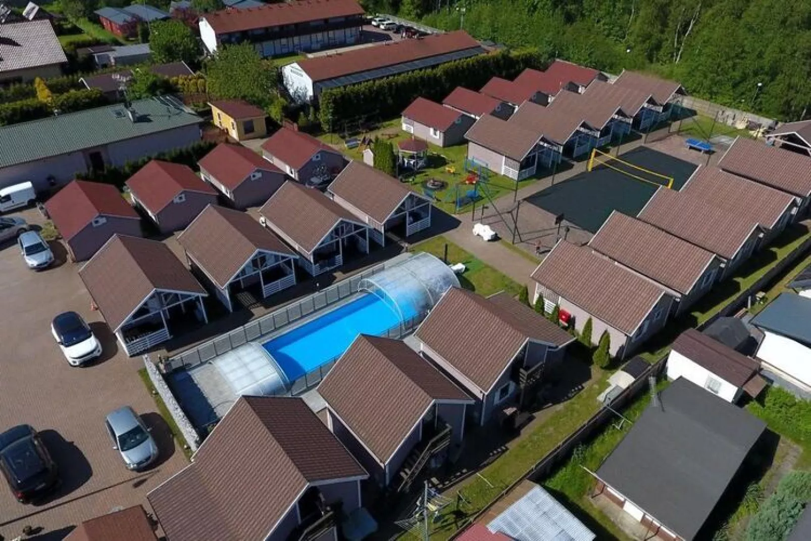 Domy wakacyjne w Międzyzdrojach z podgrzewanym basenem-Uitzicht zomer