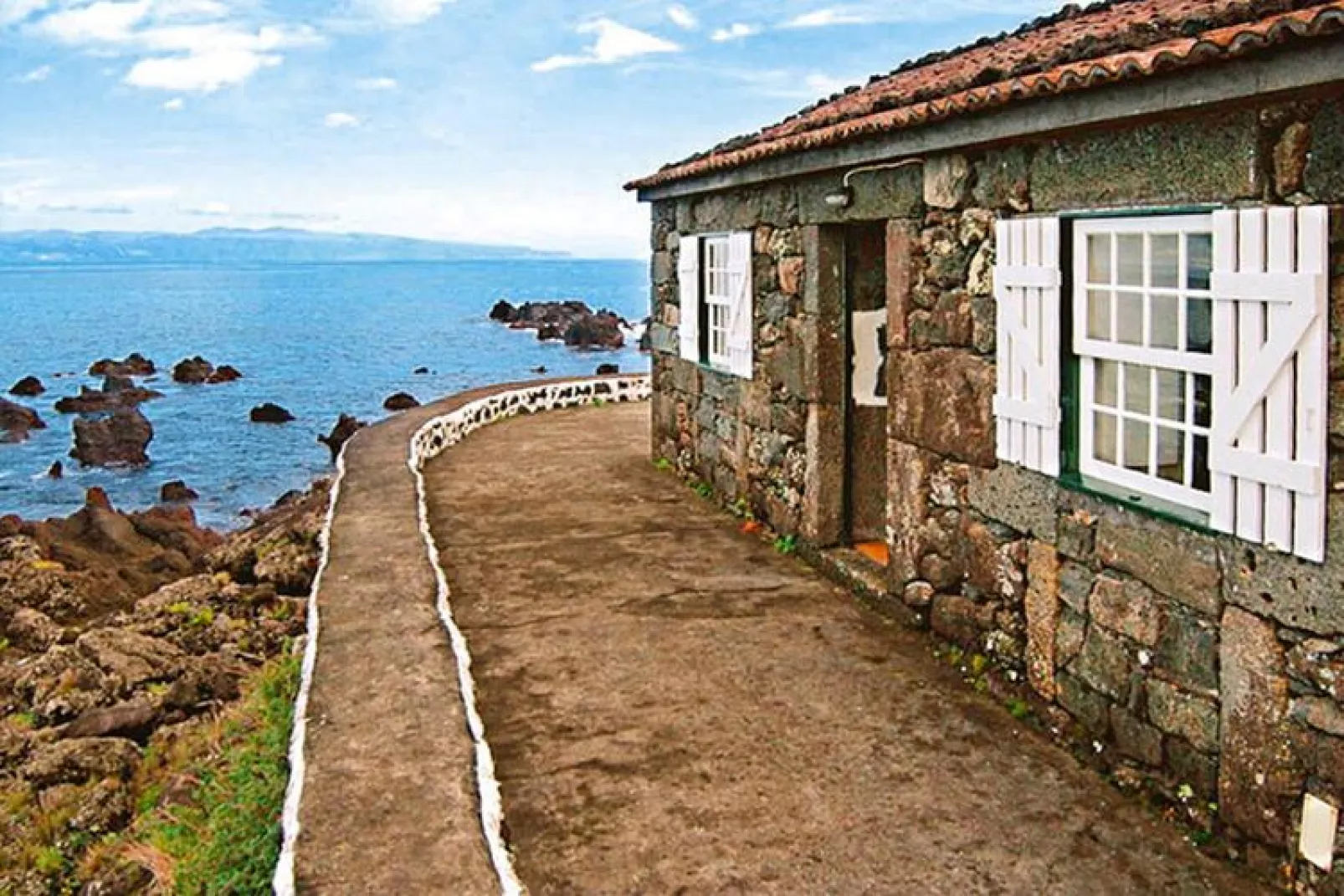 Ferienhäuser Adegas do Pico in Prainha // Adega T2 70-90m2 / sea-Waterzicht