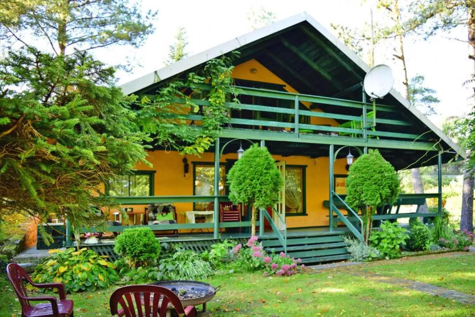 Holiday Home with whirlpool at the lake in Zakowo-Buitenkant zomer
