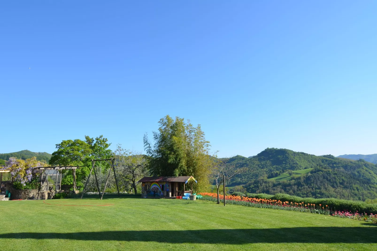 Appartamento Le Colline-Tuinen zomer