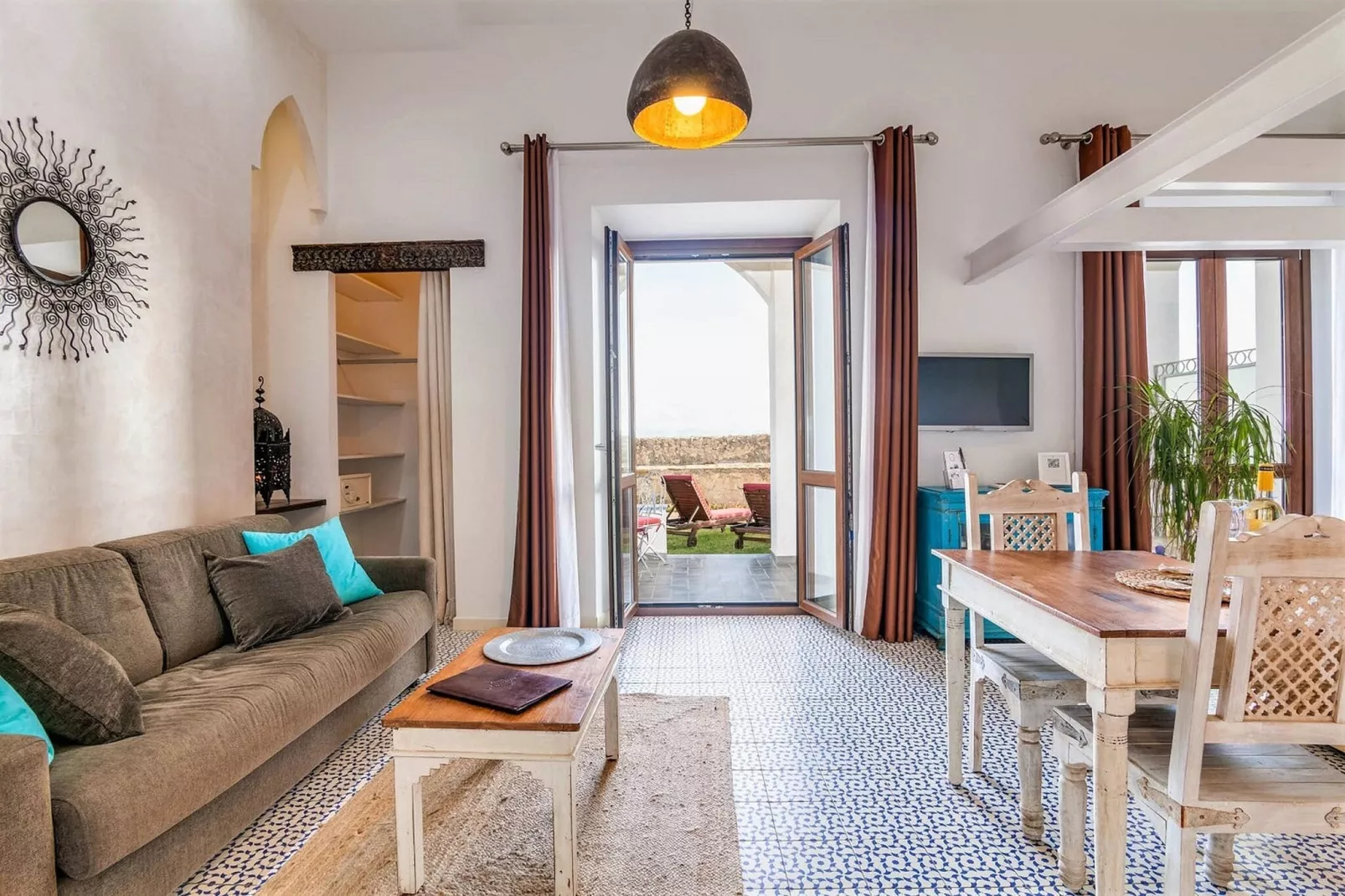 Estudio planta baja Vista al Mar Porche y Jardín 3-4-Woonkamer