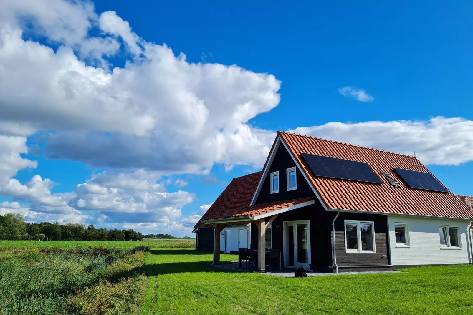 De Strandloper Huis Nr 30-Buitenkant zomer