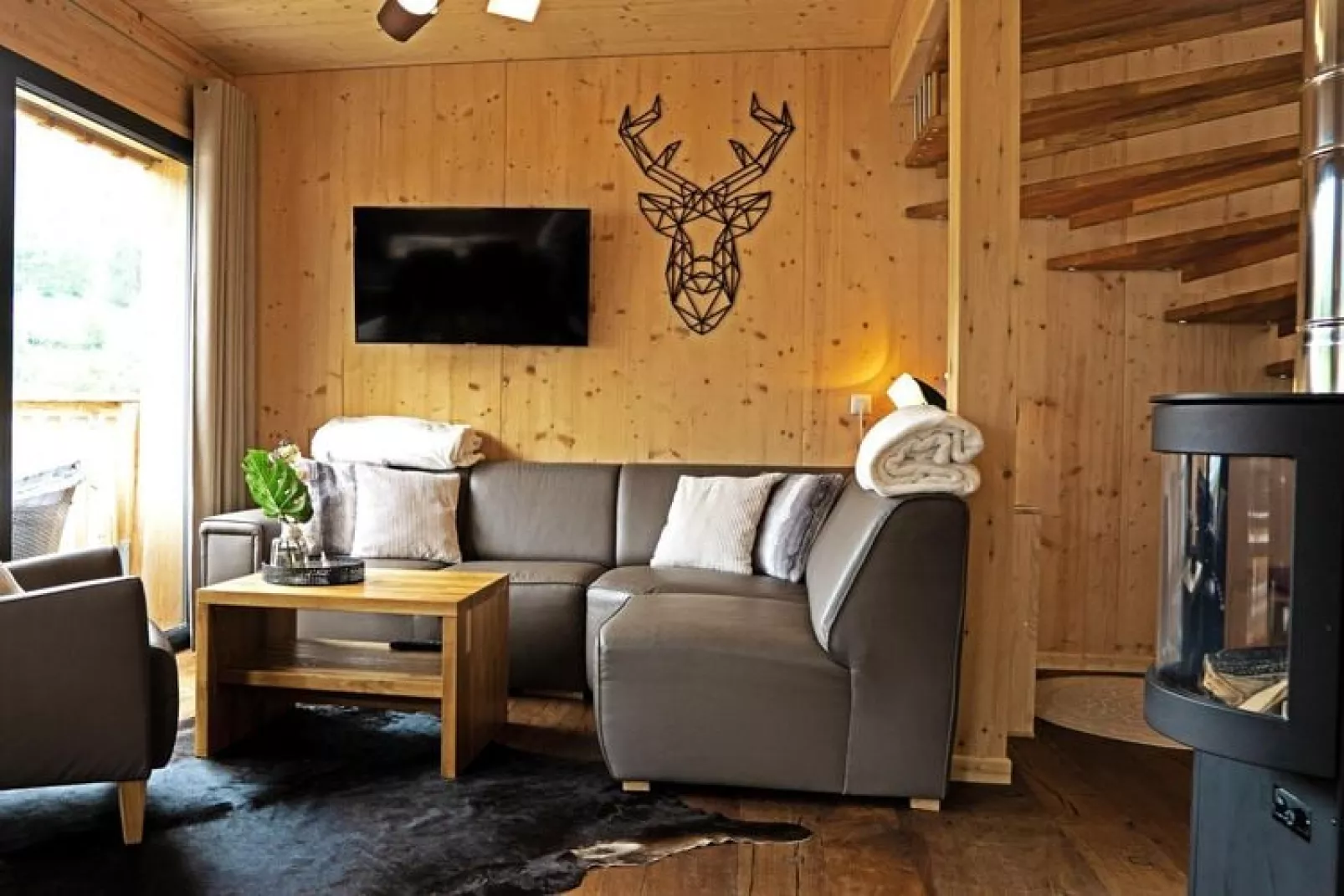 Chalets Bergeralm, Steinach am Brenner-Wellness Chalet-Woonkamer