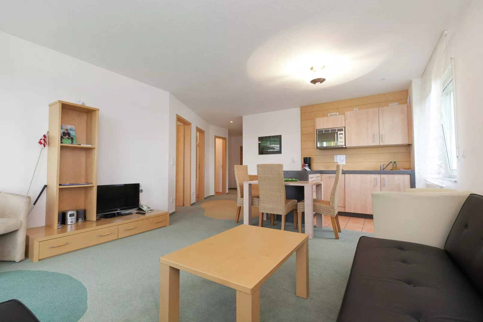 Apartmenthaus SportCHALET-Woonkamer