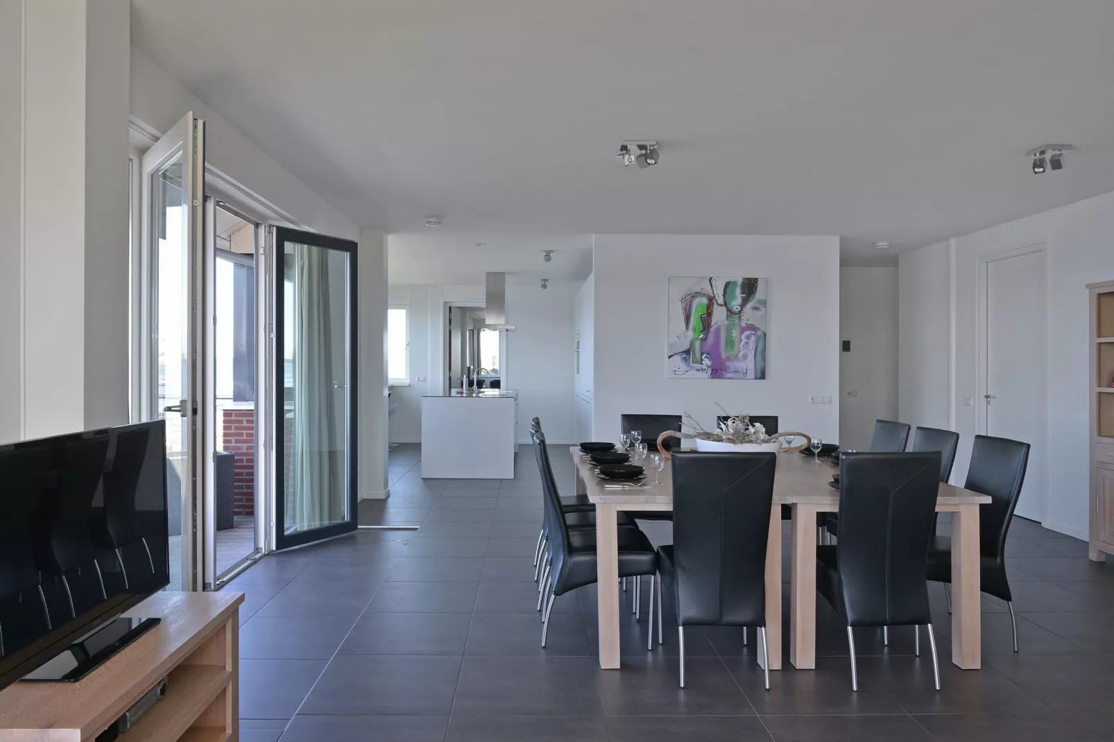 Penthouse 4a - De Schotsman Watersport-Woonkamer