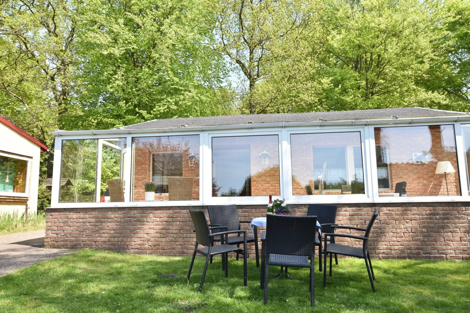 Ferienhaus mit Wintergarten-Buitenkant zomer