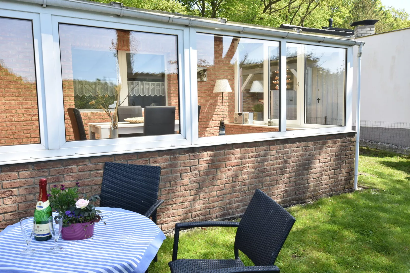 Ferienhaus mit Wintergarten-Buitenkant zomer