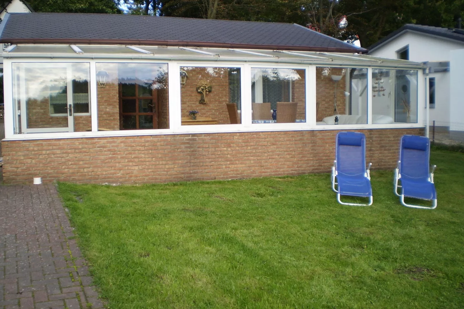 Ferienhaus mit Wintergarten-Tuinen zomer