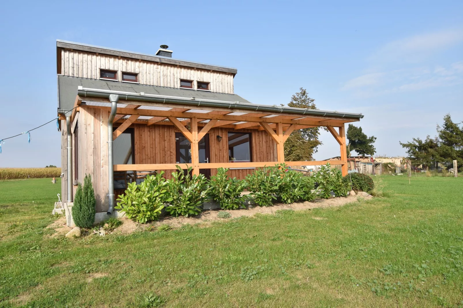 Ferienhaus Am See mit Kamin-Buitenkant zomer