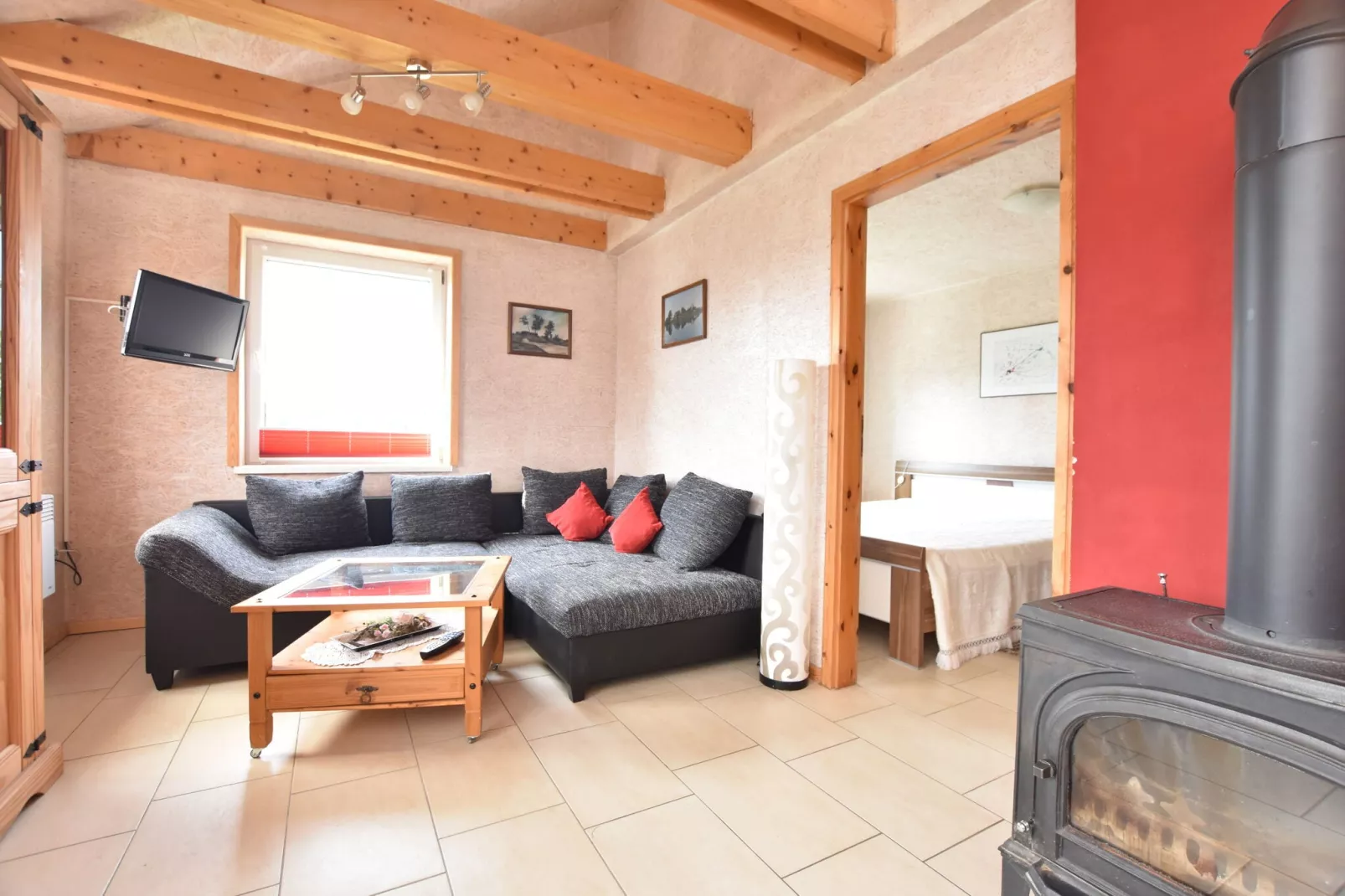Ferienhaus Am See mit Kamin-Woonkamer