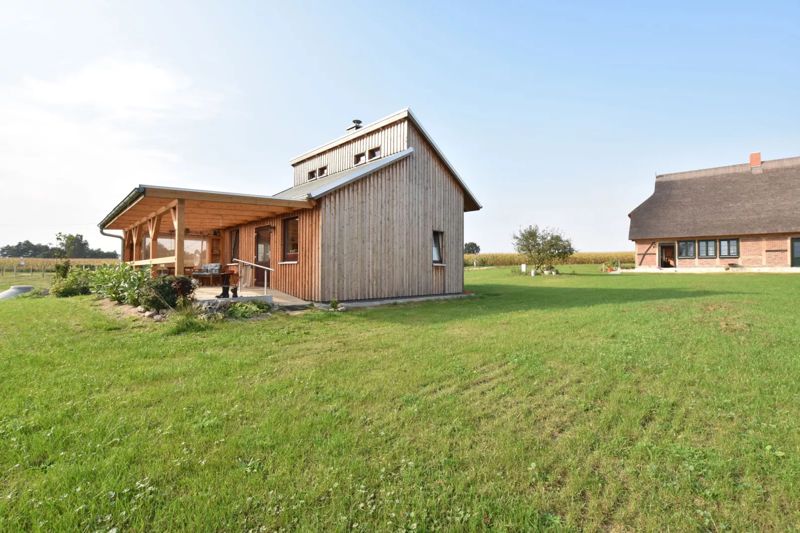 Ferienhaus Am See mit Kamin-Buitenkant zomer