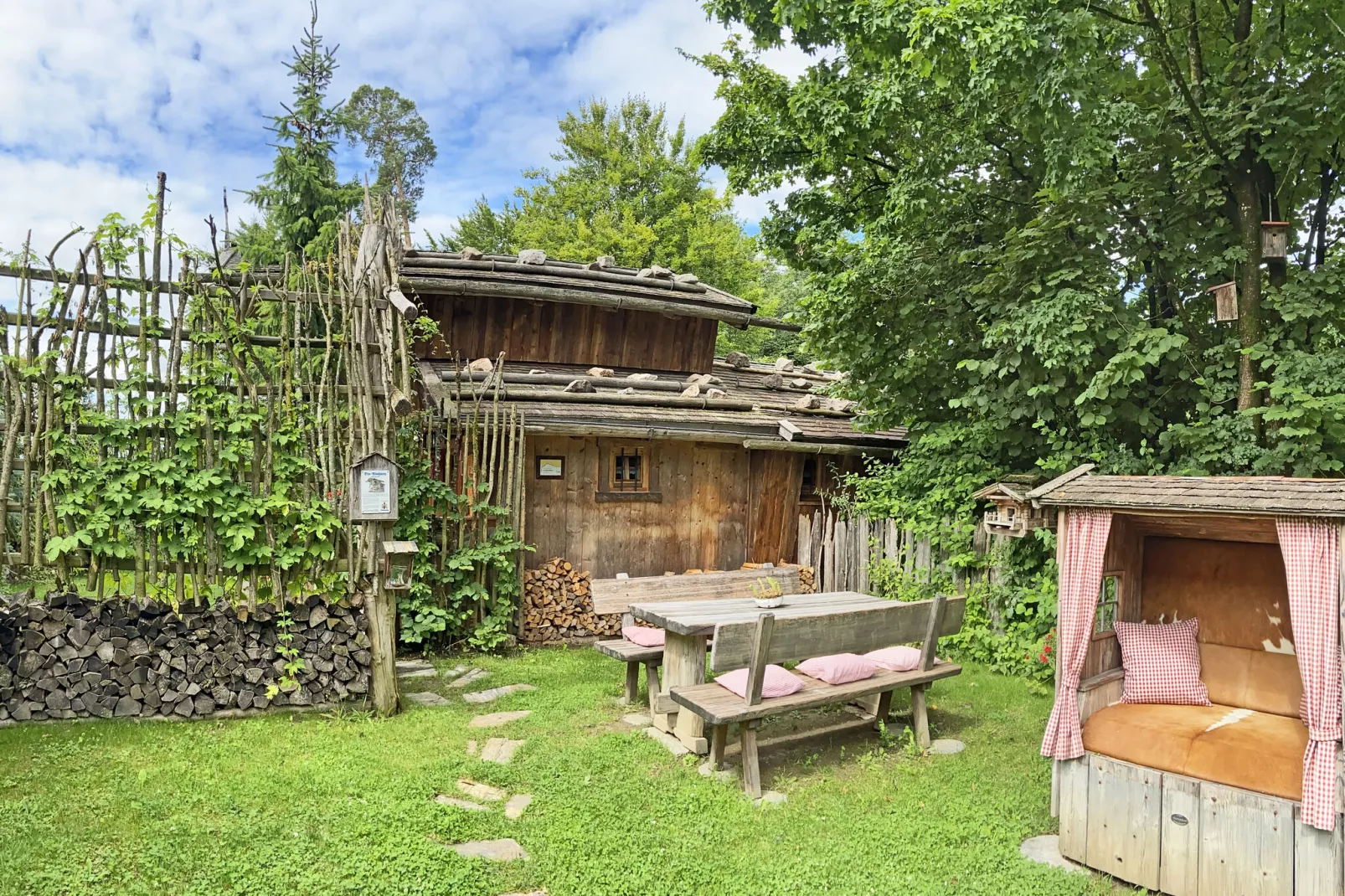 Almhütte-Tuinen zomer