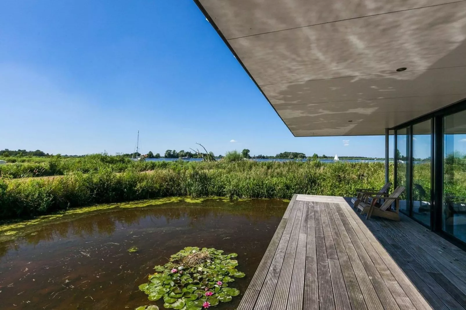 Watervilla de Blauwe Reiger-Uitzicht zomer