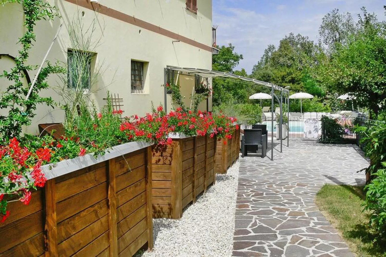 Agri-tourism La Filomena Montefortino - l'Infinito-Tuinen zomer